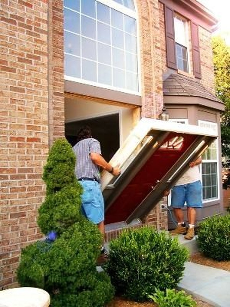 Installing exterior prehung door.