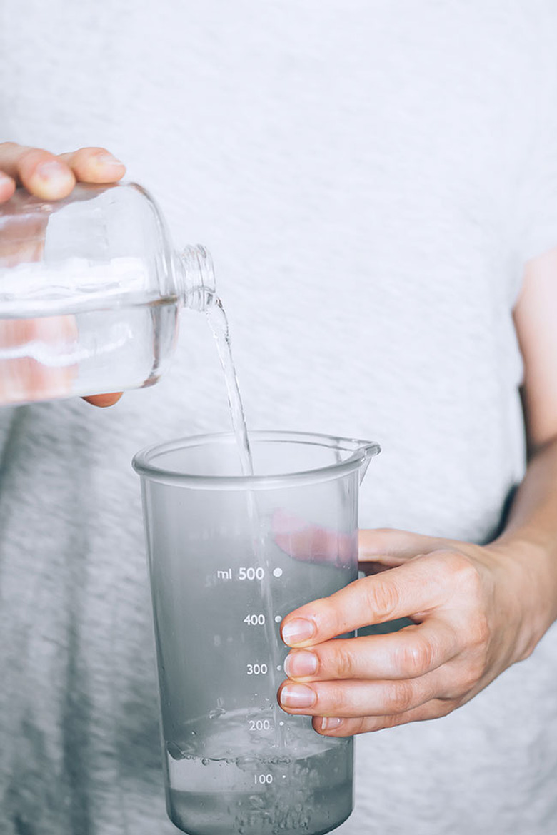 Use vinegar to remove dishwasher buildup