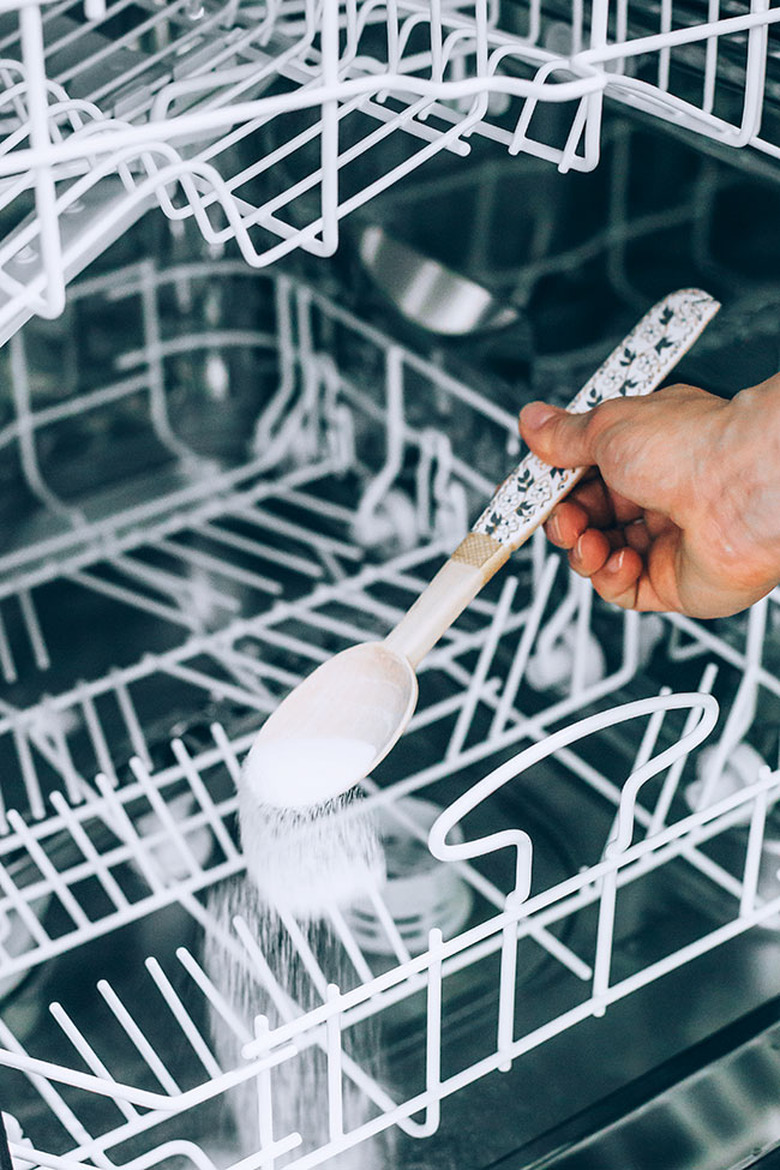 Sprinkle baking soda to clean dishwasher