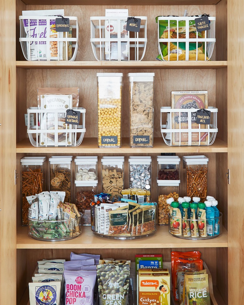 wood pantry with baskets and bins