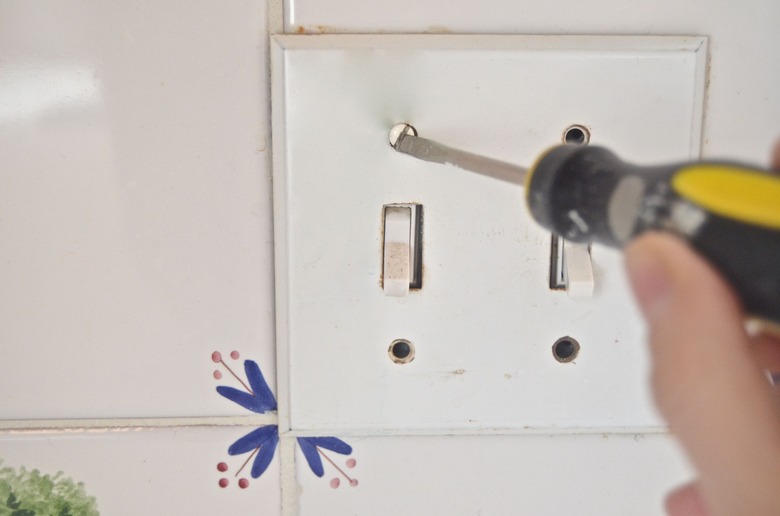 Unscrew switch plates before painting