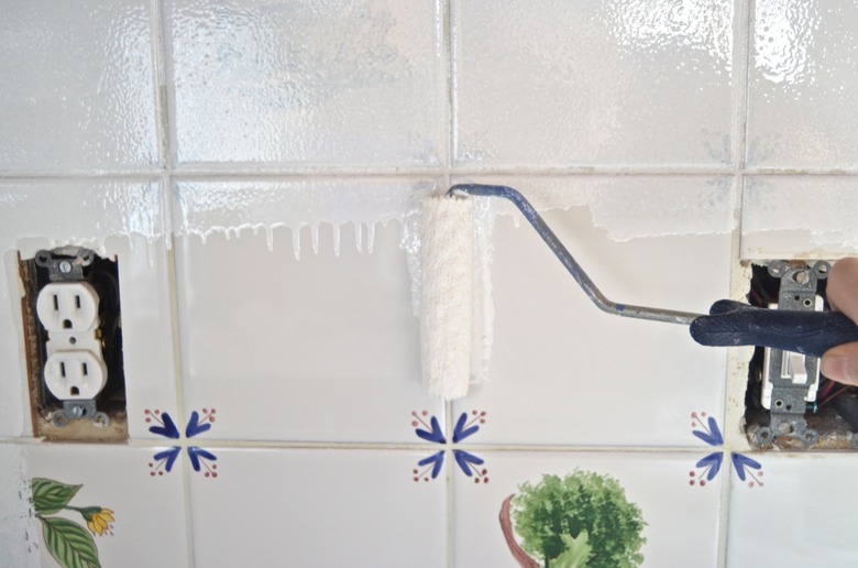 pain first coat onto tiles