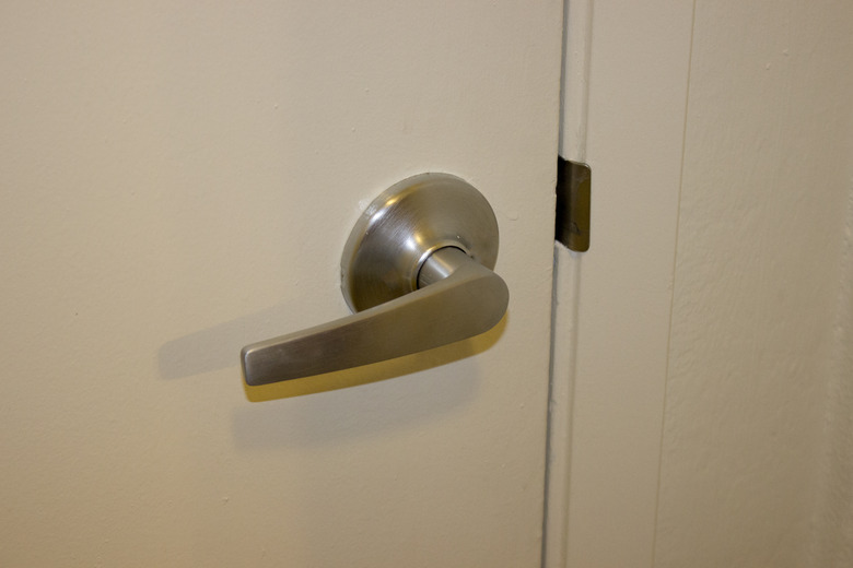 How to Remove a Lever Door Handle Without Screws Hunker