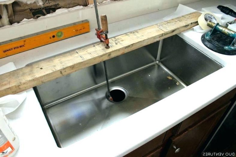 Removing undermount sink.