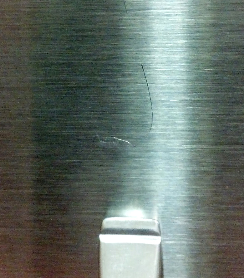 Close up of scratch on stainless steel
