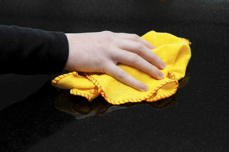 Polishing the work surfaces