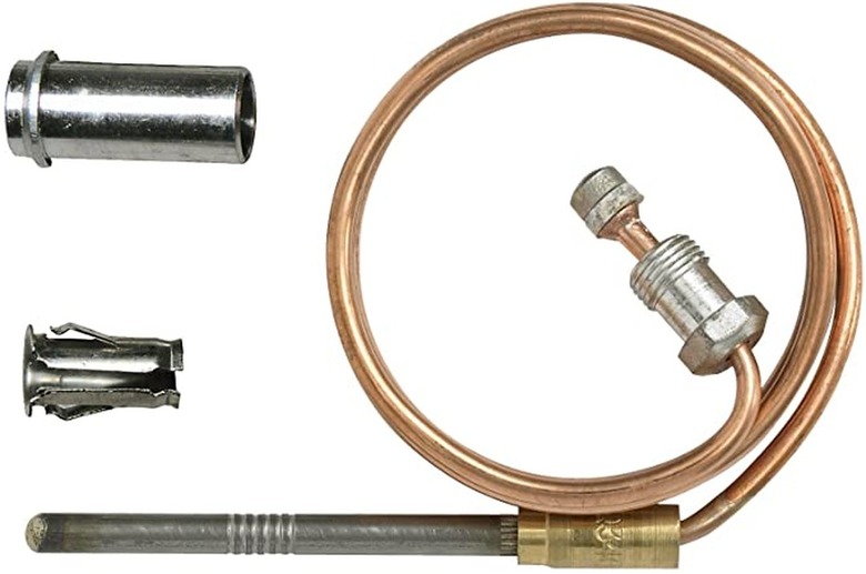 A close up of a gas furnace thermocouple part