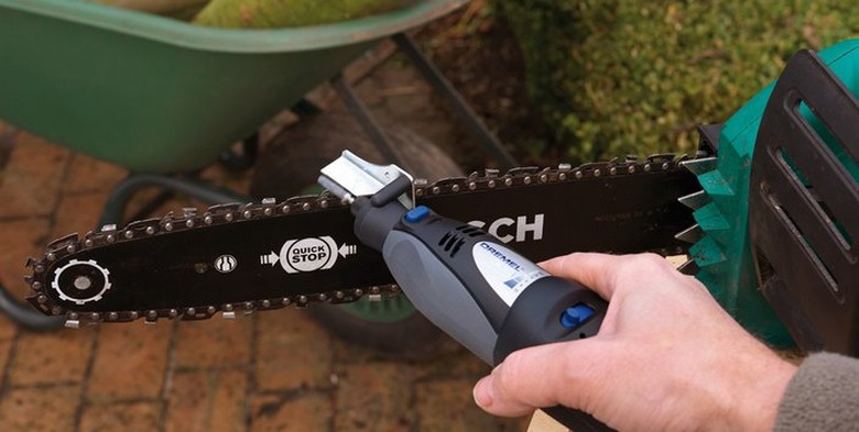 Rotary tool chainsaw attachment.
