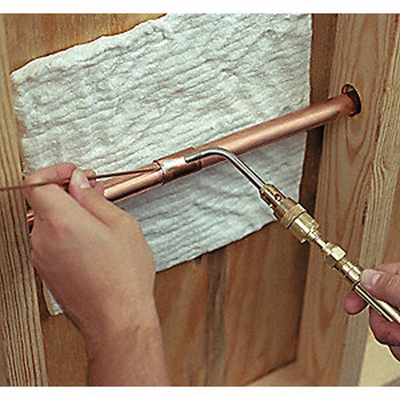 Heat shield and soldering torch.