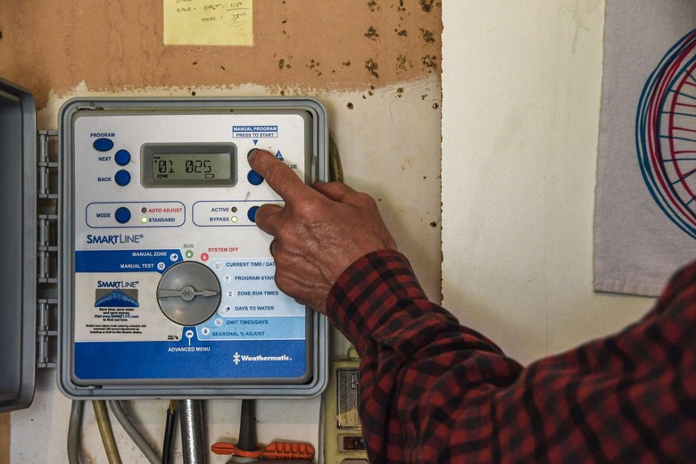 setting sprinkler system watering schedule on controller timer