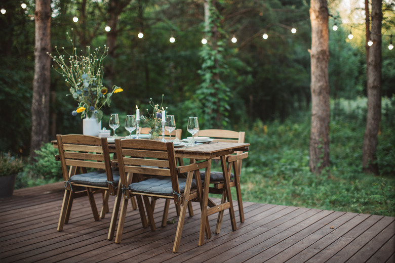 Table for dinner set on porch