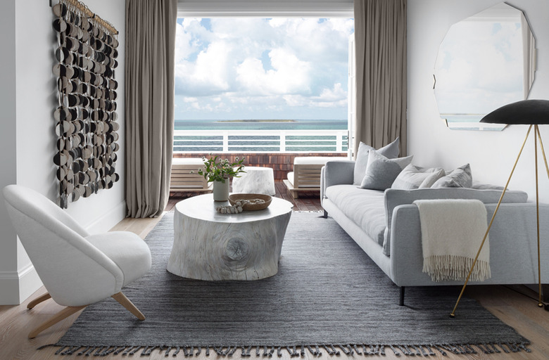 neutral living room with oversized rug