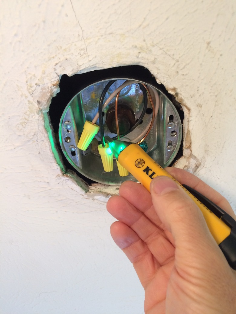 Testing wires for power with voltage tester