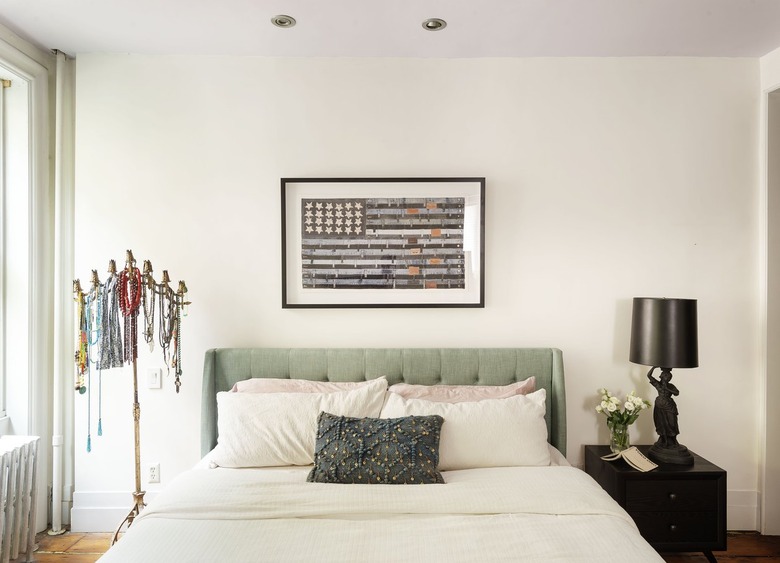 The Novogratz bedroom with upholstered headboard