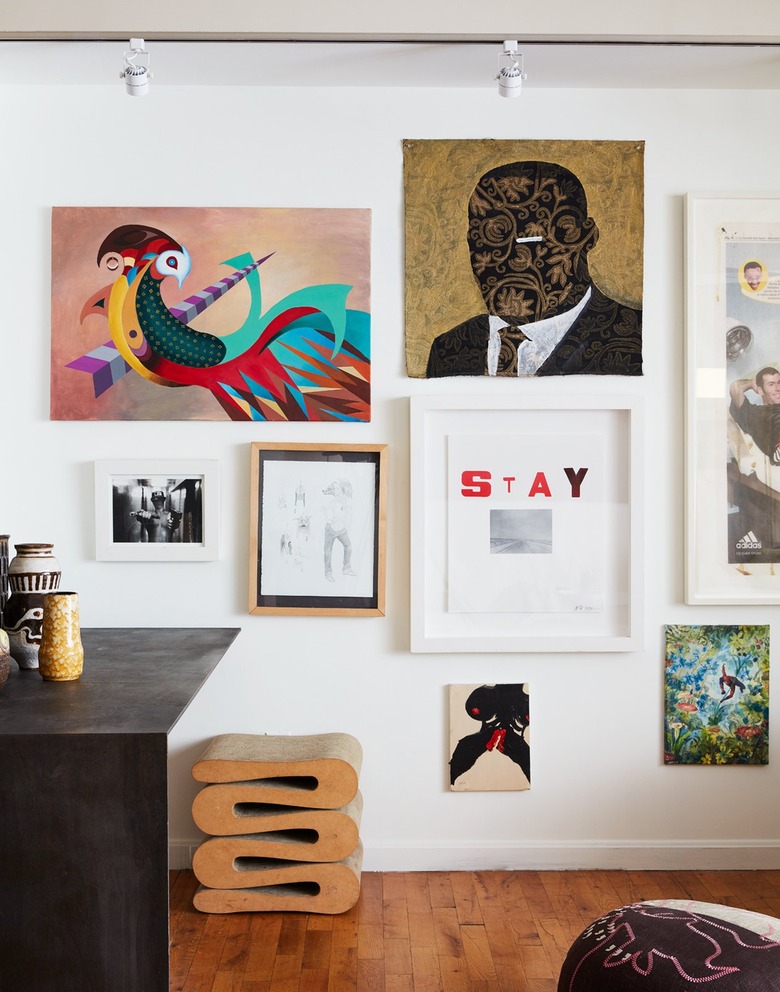 detail shot of Leyden Lewis gallery wall with framed artwork