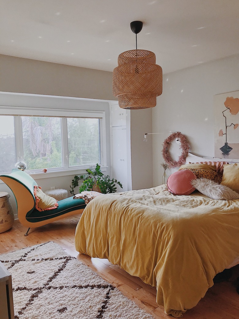 Designlovefest bedroom with Ikea pendant and yellow bedding