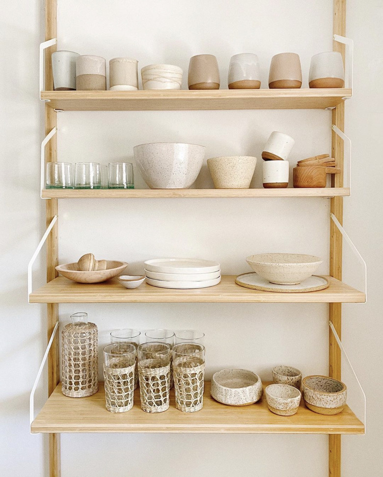 Sylvia Tribel home with ceramic dishware on shelving