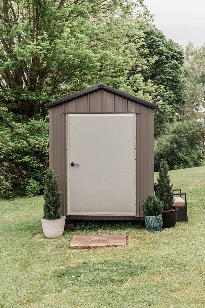 Repaint your shed's door a new color.