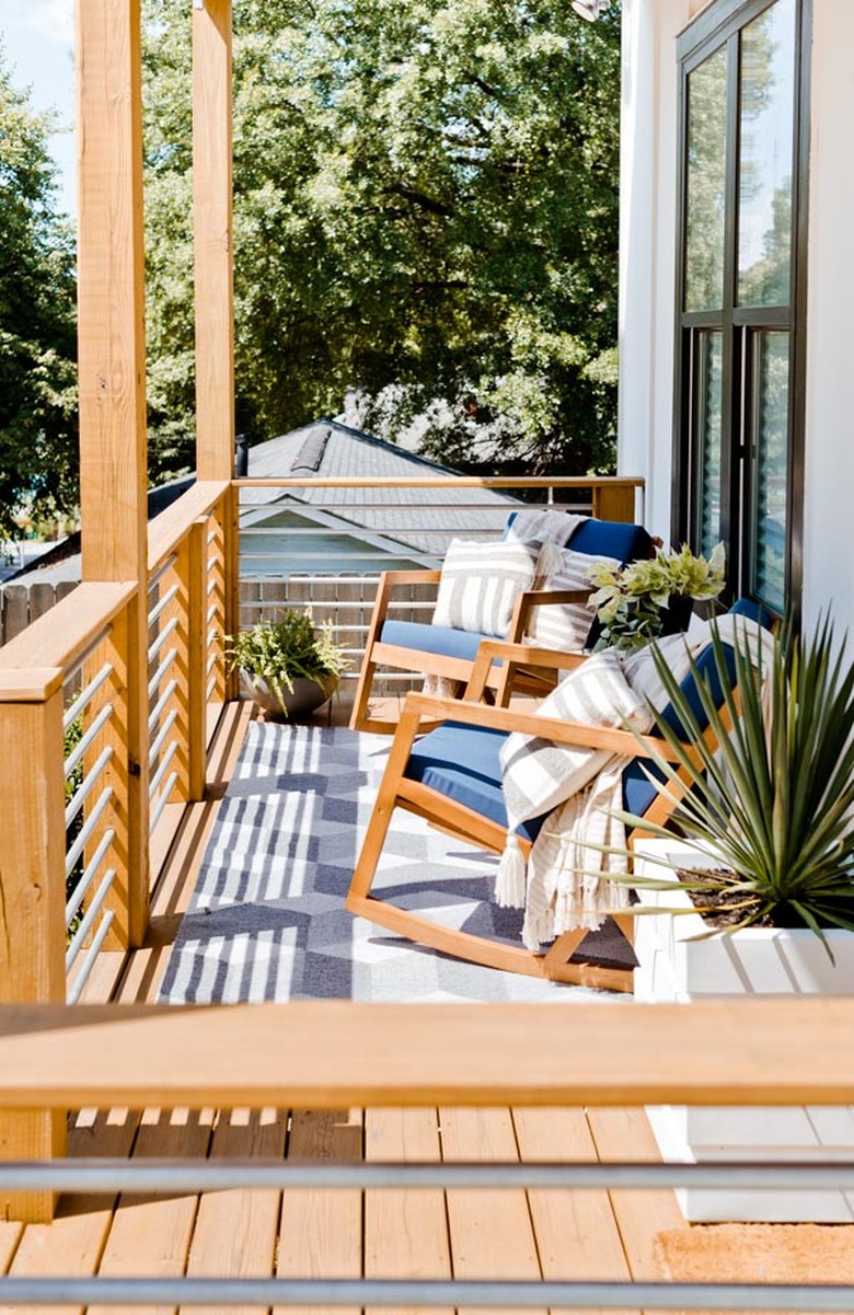 Front porch before and after with blue rocking chairs and plants