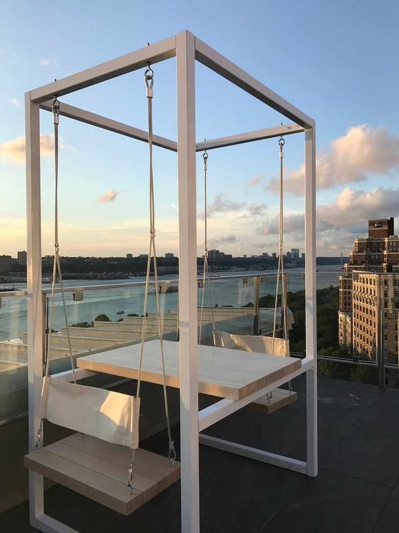 outdoor scene with swing table and chairs