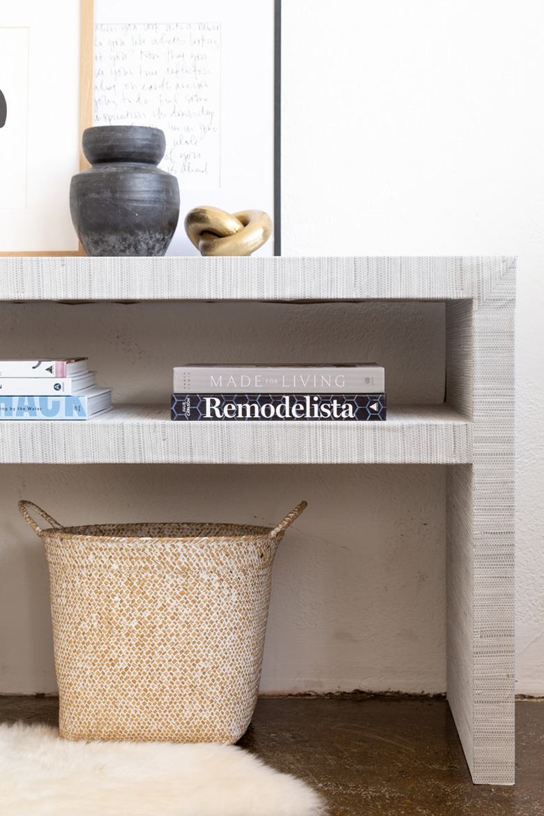 Ikea Hack grasscloth console table styled with books