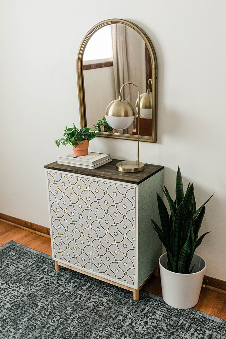 Set your finished makeover IKEA cabinet up in the entry for easy storage access.
