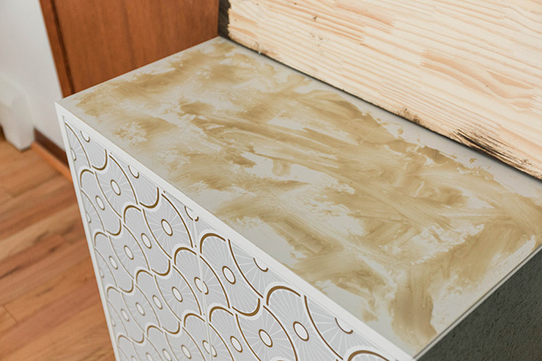 Lay down even layers of adhesive to ensure a tight fit.