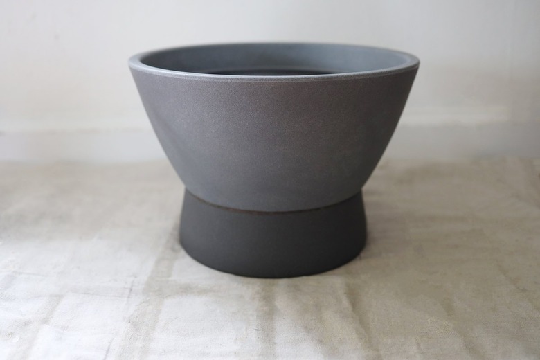 Larger planter glued on top of smaller upside-down planter