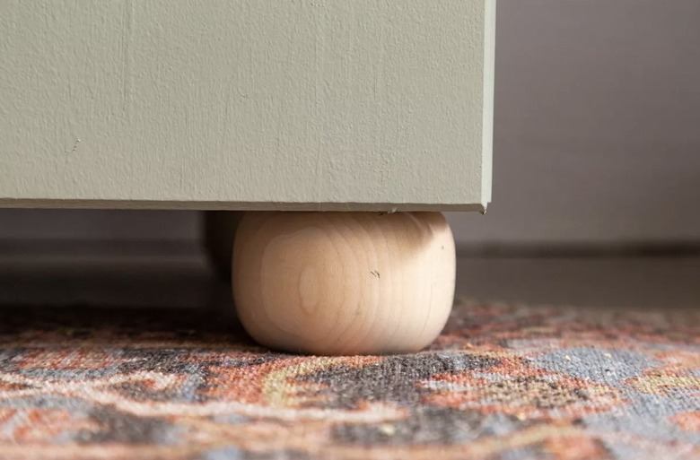 Wood leg on IKEA cabinet