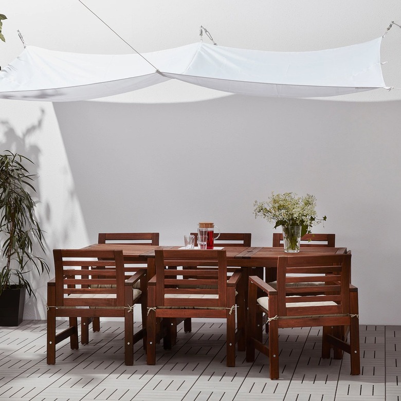 table with white canopy above it