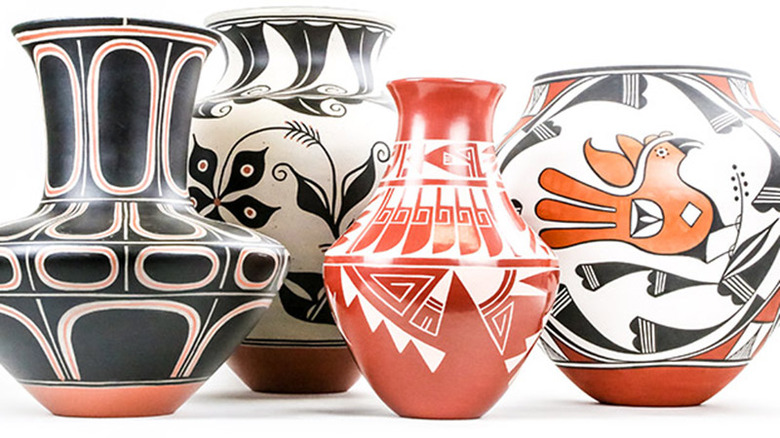 four vases in various colors