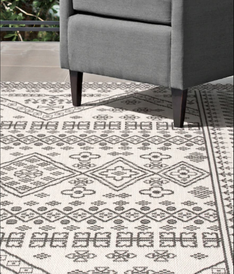 Ivory and black Moroccan style outdoor rug
