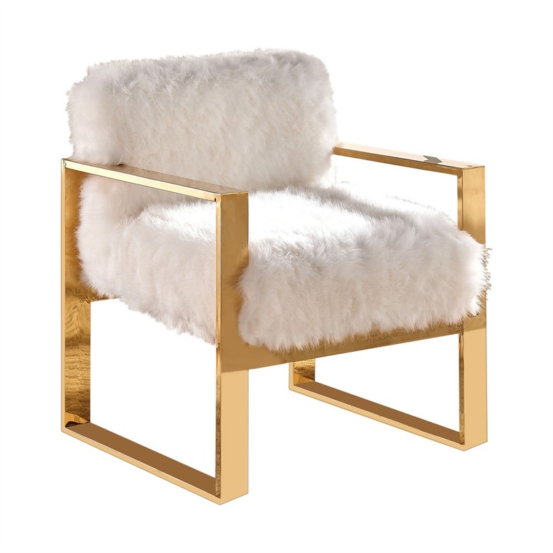 White faux fur accent chair with gold details