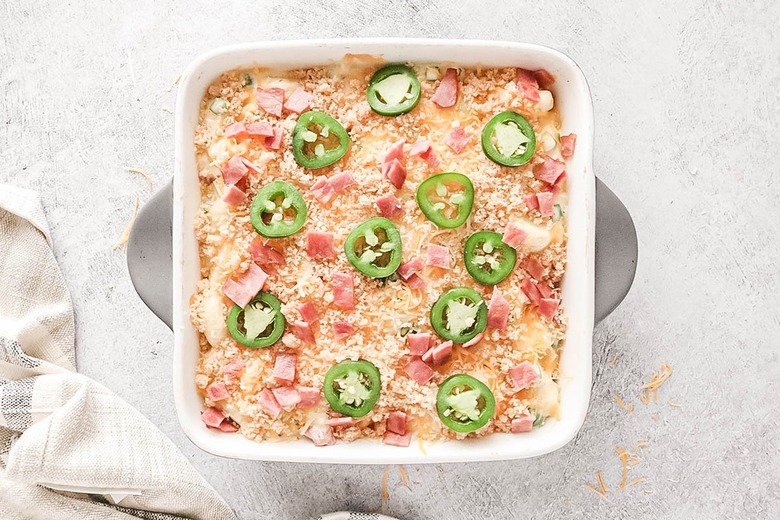 Jalapeño popper gnocchi casserole on a gray background