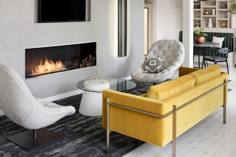 living room space with yellow couch