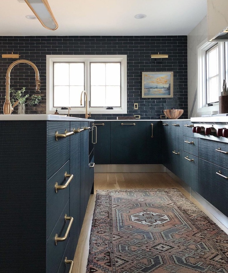 Dark teal kitchen cabinets
