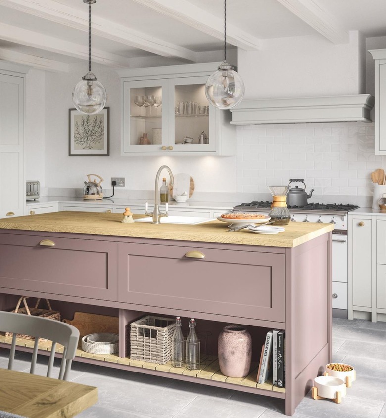 Kitchen with lilac colored island