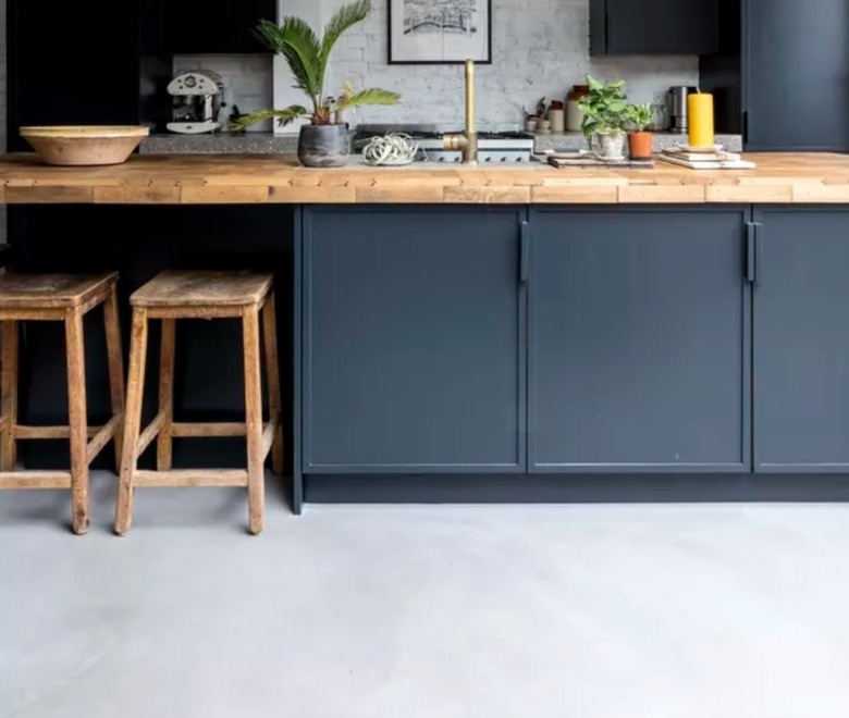 Kitchen with dark gray cabinets