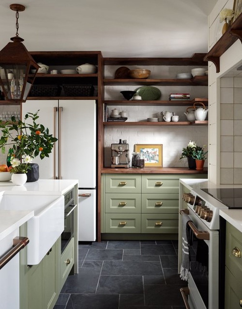 Kitchen with light green cabinets