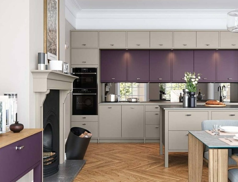Kitchen with light gray and purple cabinets