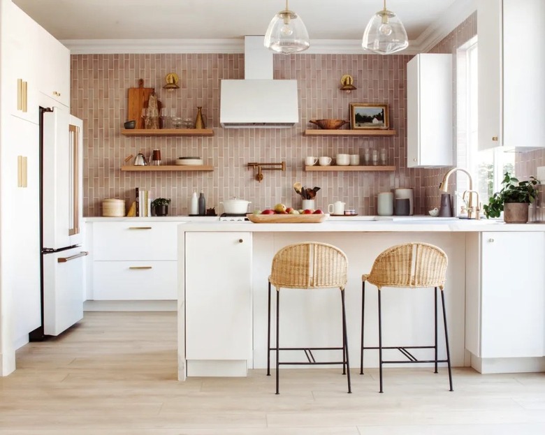 white kitchen color scheme with metallic pink backsplash tile