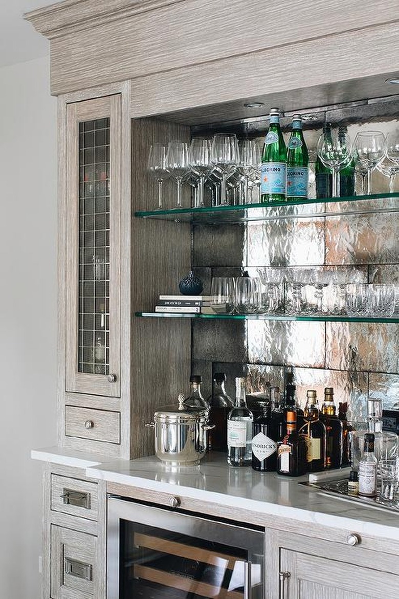 kitchen with light brown cabinets and silver wall