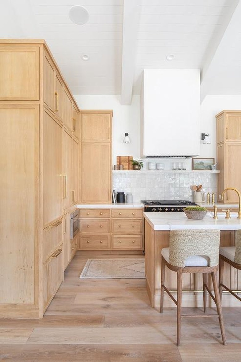 kitchen with light brown cabinets and beige accents