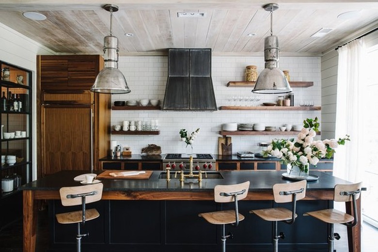 Industrial kitchen with dark wood cabinets