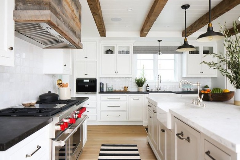 Rustic kitchen with custom reclaimed wood hood