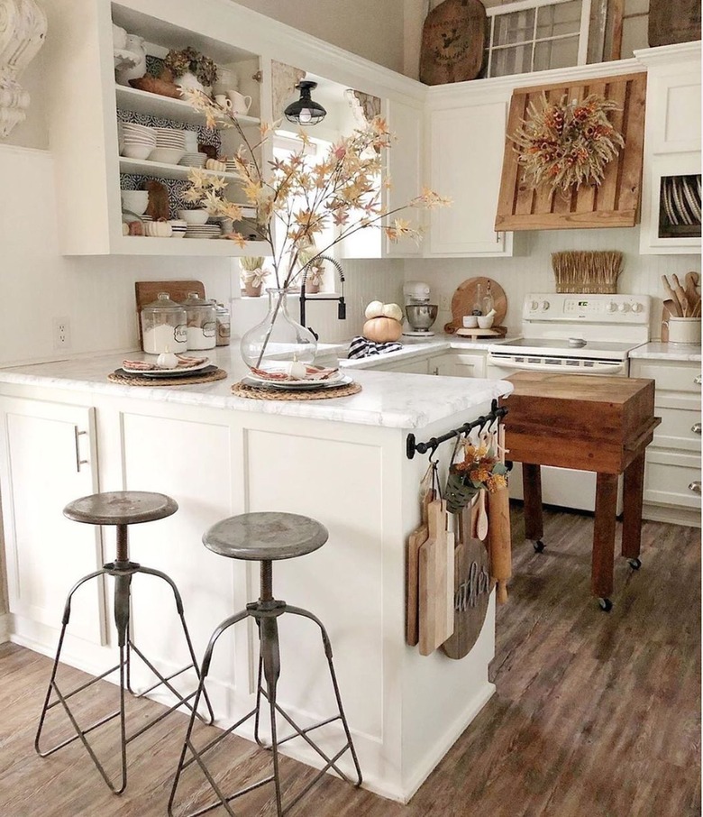 Wooden small kitchen island in tiny home