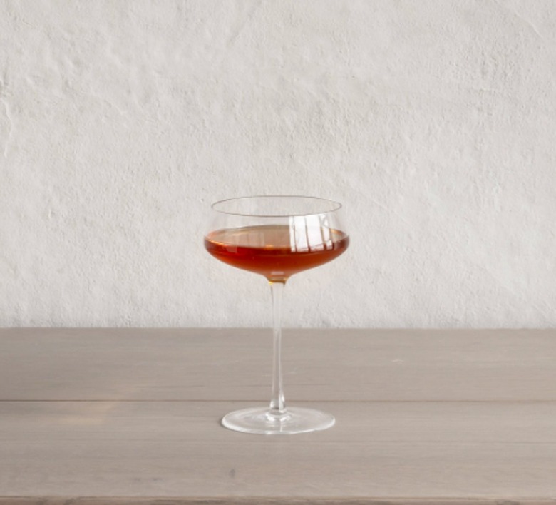 coup glass with cocktail