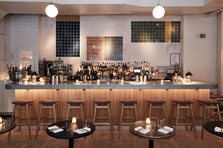 Close up of De Maria bar with tile installation.