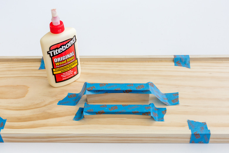 Glue down the book holder pieces.