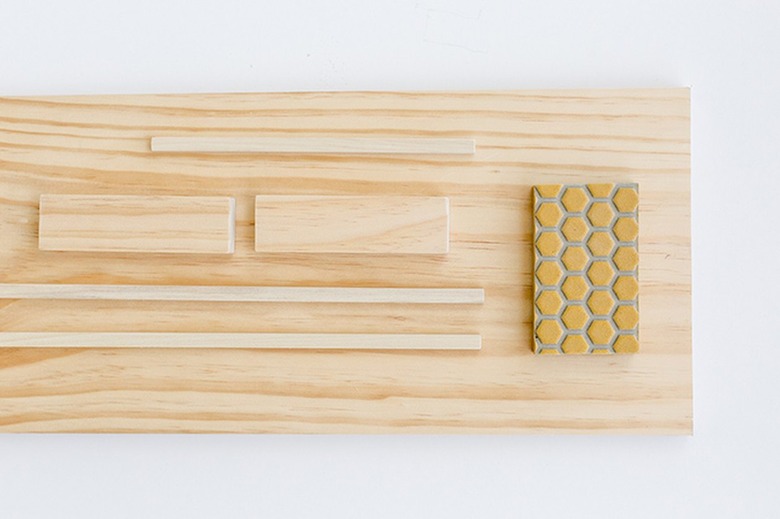 Wood board with sanding block